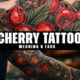 What is the symbolic meaning behind a cherry tattoo?