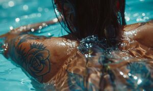 Is it safe to swim after getting a tattoo?